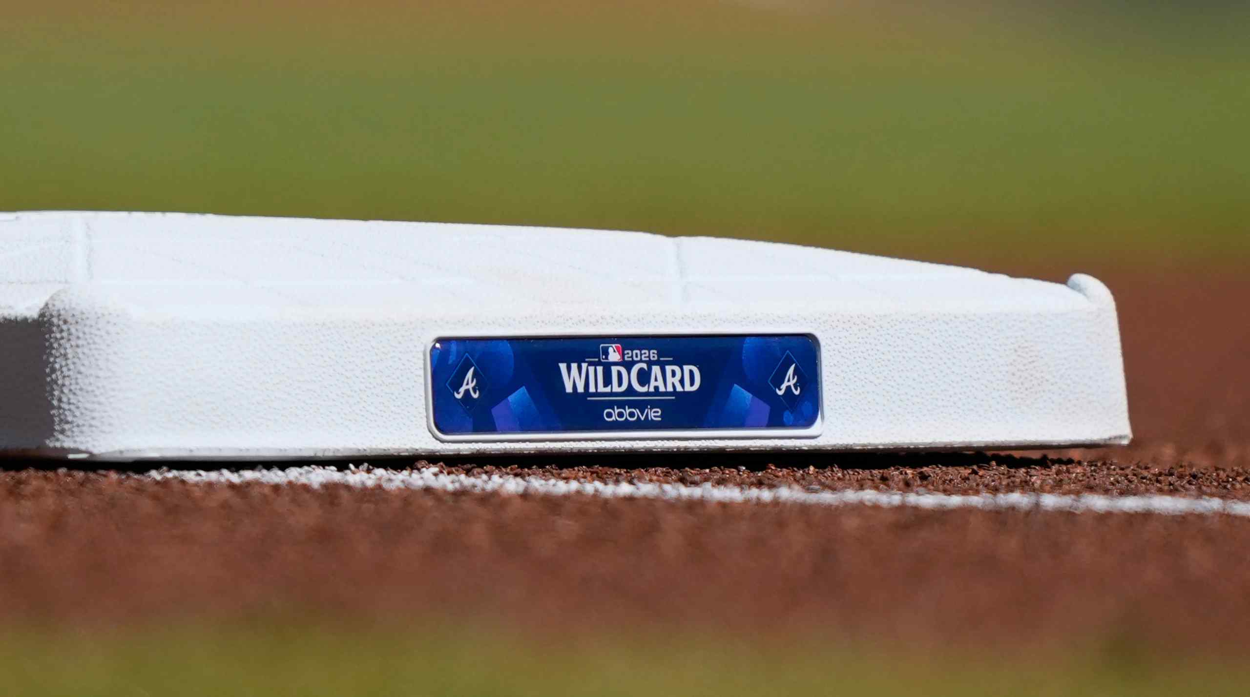 A base advertising the 2026 MLB Wildcard.